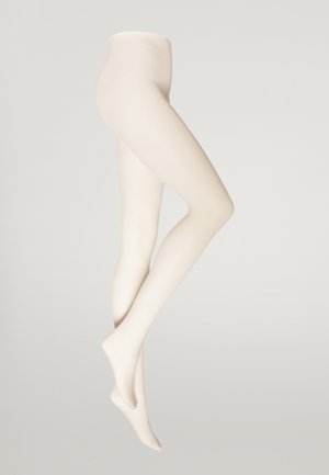 Collant opachi di colore crema, con una texture a coste, finitura liscia e vita alta. Nessun motivo o accessorio visibile.