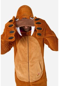 Brūns mīksts walrusa kostīms ar kapuci, pārmērīgām zobiem, auss detaļām un plaukstas formas cimdiem. Iekļauj priekšējo rāvējslēdzēju un kabatu.