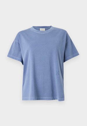 Light blue cotton t-shirt with short sleeves, a round neckline, and a small embroidered logo on the left side. Smooth texture and relaxed fit.
