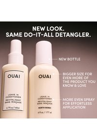 Two OUAI leave-in conditioner bottles side by side showing new larger bottle with spray and old smaller pump bottle.