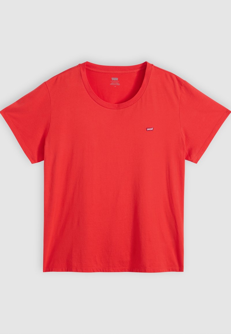 Camiseta de algodón roja con cuello redondo, mangas cortas y un pequeño parche con el logo de Levi's en el lado izquierdo del pecho. Textura suave, corte relajado.