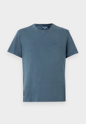 Blue cotton t-shirt with a round neckline, short sleeves, and a small embroidered logo on the chest. Features a relaxed fit and soft texture.