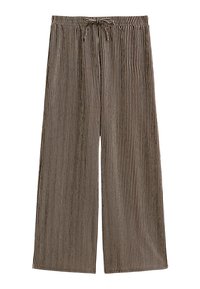 Pantalons larges en tissu doux, avec une taille à cordon de serrage, ornés de rayures verticales marron et crème, offrant une coupe décontractée.