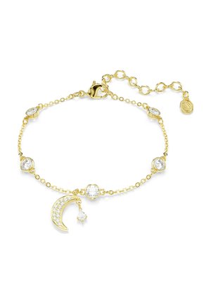 Guldbelagt armbånd med runde klare sten, justerbar kæde, hummerlås og en halvmåne-charm med små krystaller. Ingen personer synlige.