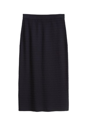 Jupe crayon bleu marine foncé avec un motif texturé en nid d'abeille. Dotée d'une taille élastique et d'une coupe droite, se terminant juste au-dessus du genou.