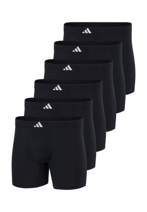 Seks par sorte atletiske boxer briefs med et hvidt adidas-logo på linningen arrangeret i en skiftevis række.
