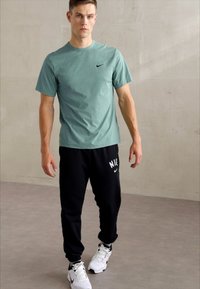Nike Performance JOGGER - Tepláky - black/white