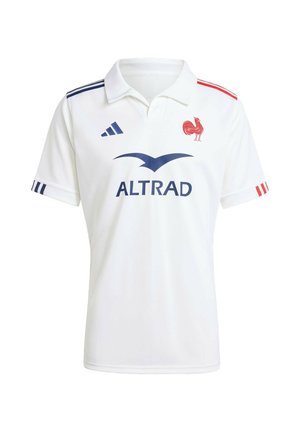 Polo shirt blanc à manches courtes avec col, présentant des accents rouges et bleus sur les manches. Comprend un logo bleu et un emblème de coq rouge.