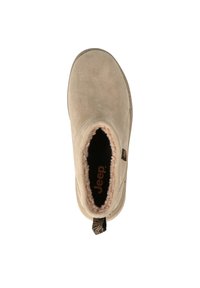 Stivale alla caviglia in suede beige con un morbido interno foderato in pelliccia, suola testurizzata e una linguetta con motivo zebratica sul retro.