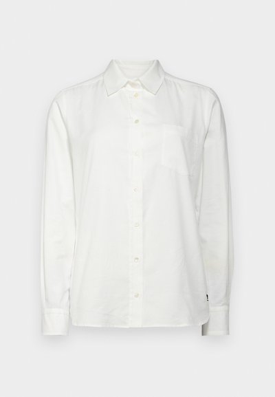 White long-sleeved shirt made of cotton, featuring a button-down collar, front pocket, and button closure down the center. Smooth texture.