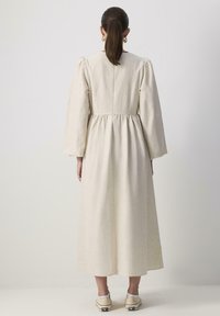 Touché Privé BALLON SLEEVE BOW - Maxi dress - stone
