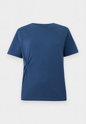 T-shirt bleu à manches courtes avec un subtil nœud latéral à la taille gauche, présenté sur fond blanc.