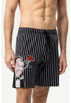 Schwarz-weiß vertikal gestreifte Shorts mit einem Cartoon-Mann, der eine rote Rose hält, auf der linken Seite bedruckt.