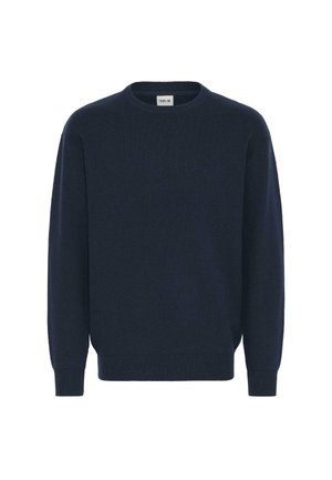 Mørkeblå strikkegenser med rund halslinning, lange ermer og ribbestrikkede mansjetter og hem. Laget av mykt stoff med et strukturert mønster.