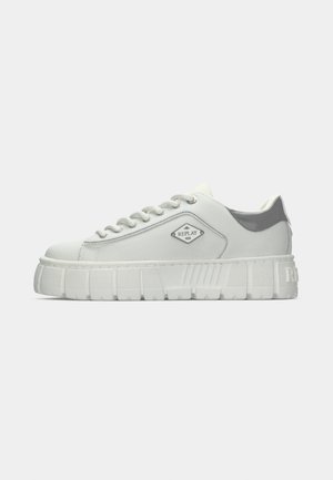 White low-top sneaker with thick textured sole, grey heel patch, white laces, and "Replay" logo on the side.
