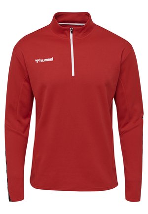 Röd långärmad tröja med halvmatchningskrage, texturerad tyg, och vitt logo på vänster bröst. Svart accent på ärmarnas manschetter.