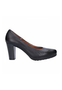 Zapato de tacón alto de cuero negro con puntera redondeada, tacón de bloque texturizado y parte superior suave. La suela presenta un ligero patrón de agarre.