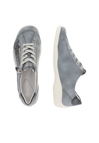 Grey leather sneakers with a smooth texture, featuring a side zipper, round toe, and contrasting accents. Soft, lightweight sole.