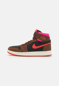 High-top sneaker with brown suede and black textile panels, neon pink accents, and red branding. Features a white midsole and patterned rubber outsole.