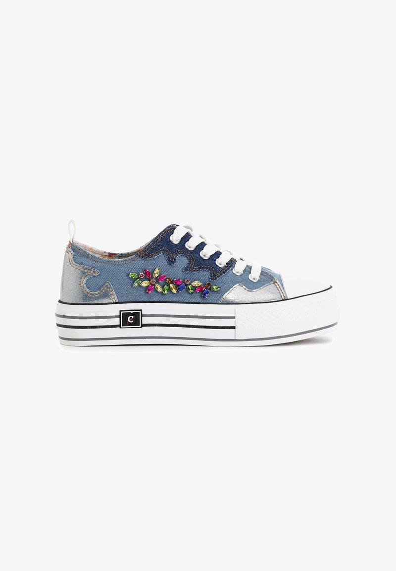 Denim and silver sneakers feature a white rubber toe cap, striped sole, and embroidered floral pattern with colorful accents.