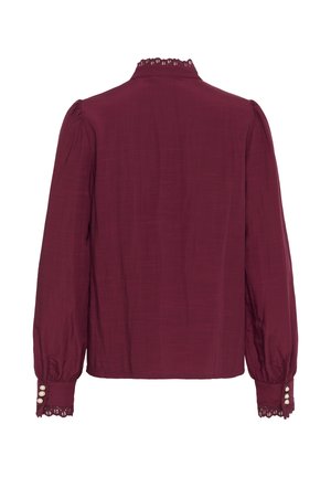 Blusa borgogna con maniche lunghe e a sbuffo. Presenta un colletto con bordi in pizzo e polsini con bottoni, realizzata in un tessuto leggero e texturizzato.