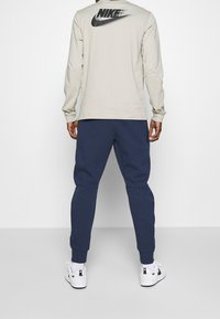 Nike Sportswear Pantaloni sportivi - dark blue
