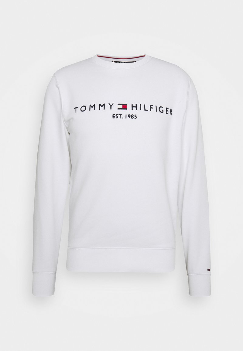 White sweatshirt made of cotton with a crew neckline, featuring "TOMMY HILFIGER EST. 1985" printed in black and red accents.