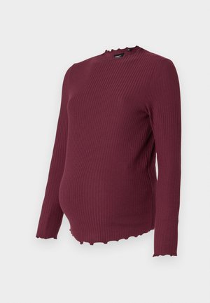 Tricou de maternitate cu mânecă lungă din material ribbed în nuanță burgundy, având un decolteu și o margine din dantelă, design ajustat și textură moale.