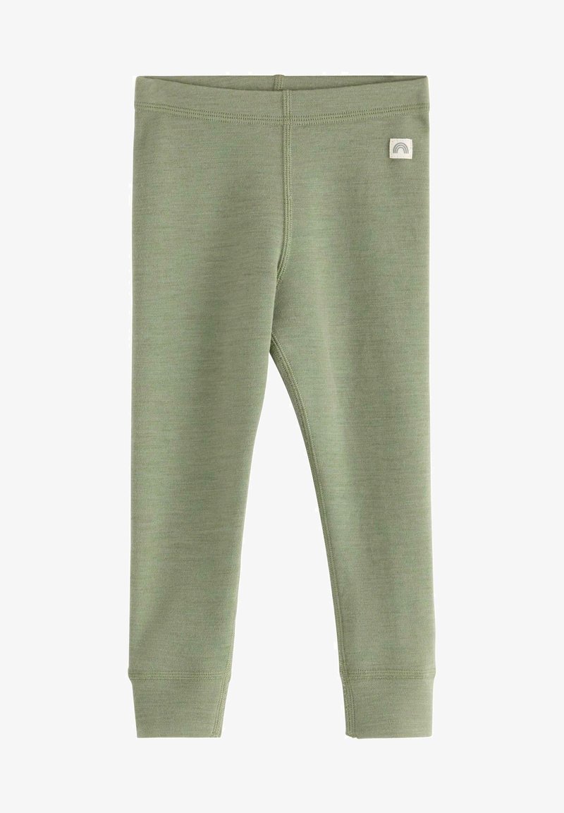 Zielone legginsy wykonane z miękkiego, elastycznego materiału. Posiadają płaski pas i małą łatkę z tęczowym logo na górnej lewej stronie.