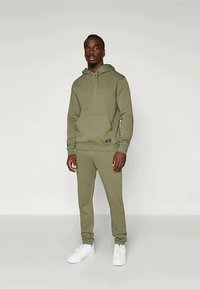 Björn Borg CENTRE SWEATPANTS - Treniņtērpa apakšdaļas - dusty olive