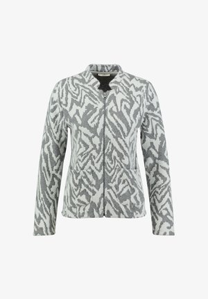 Giacca in pile a motivo zebra grigia e bianca, chiusura con zip, maniche lunghe, due tasche anteriori, texture morbida, design del colletto arrotondato.