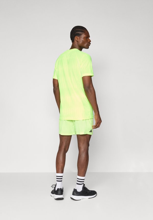 TENNIS ERGO - Sports shorts - lucid lemon4