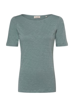 T-shirt femme à manches courtes, bleu-vert clair, avec col rond et tissu subtilement texturé, étiquette de marque visible à l'intérieur du col.