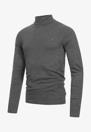 Pull à col roulé gris en tissu doux, avec des manches longues et une coupe ajustée. Étiquette sur le côté inférieur. Style minimaliste.
