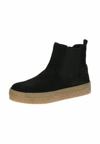 Bottines en suède noir avec des panneaux latéraux en élastique, bout arrondi et semelle en gomme texturée, présentant un design minimaliste et un accent de logo.