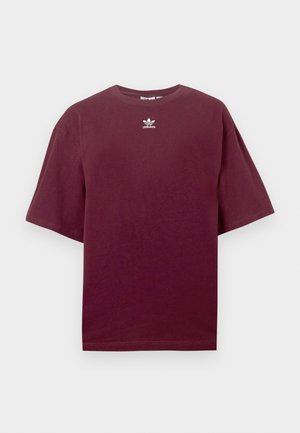 Bourgognefarvet bomulds-T-shirt med rund hals og korte ærmer, med en hvid Adidas-logo centreret på brystet. Glat tekstur.