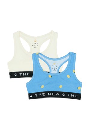 Dwa sportowe biustonosze z racerback dla dzieci, jeden w kolorze kremowym, drugi niebieski z nadrukiem cytryn, oba z czarnymi elastycznymi paskami oznaczonymi "THE NEV".