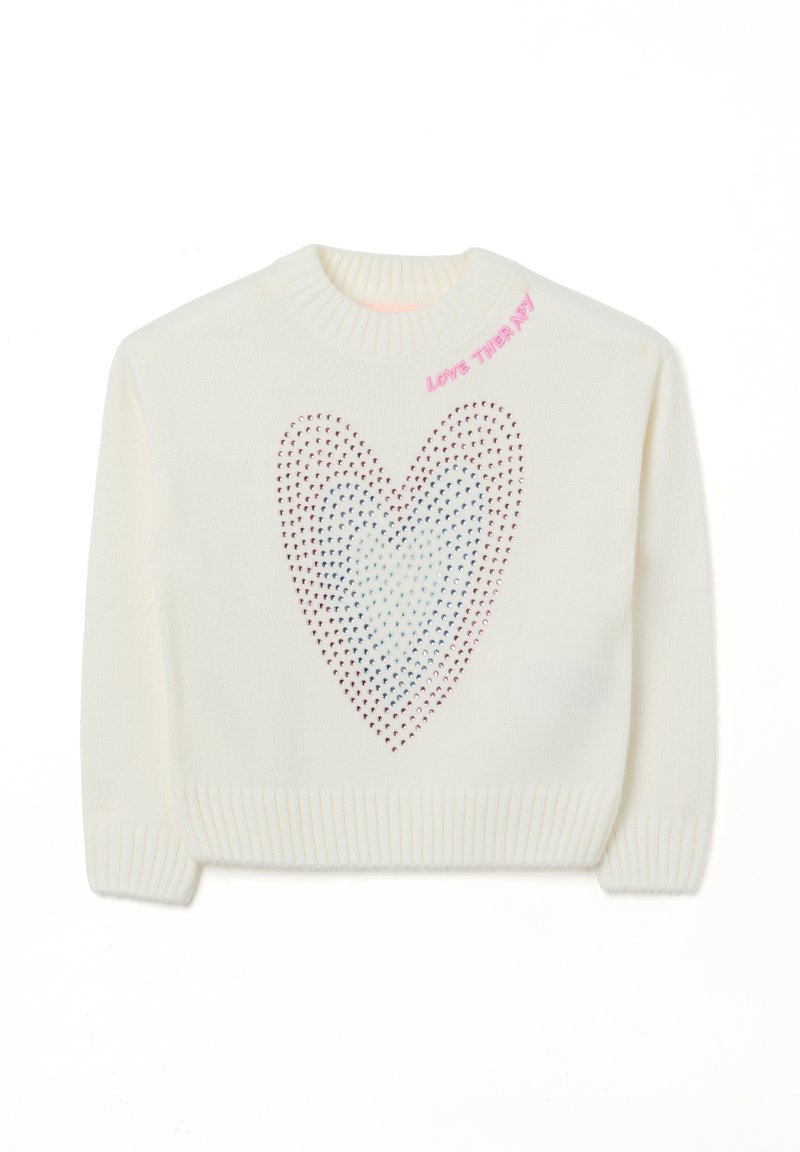 White knitted sweater featuring a heart design made of holes in shades of pink and blue, with "LOVE THERAPY" stitched in pink at the collar.