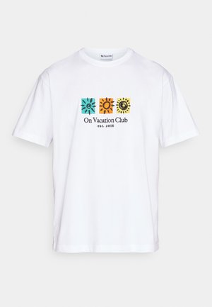 White T-shirt with three colorful sun icons in teal, orange, and yellow above "On Vacation Club est. 2016" text on front center.