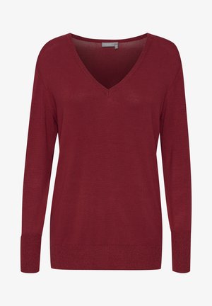 Burgundský sveter s V-výstrihom a dlhými rukávmi, s rebrovanými manžetami a jemným, textúrovaným povrchom. Disponuje jemným leskom na leme a manžetách.