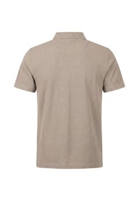 Polo beige à manches courtes vu de dos avec un col classique et un tissu texturé.