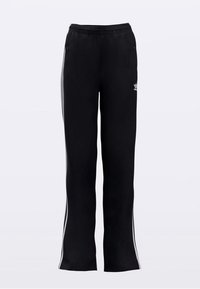 Mustad lahtised trennipüksid, mis on valmistatud siledast kangast, valgete küljeribade ja lukuga taskutega. Vasakul reiel valge logo.