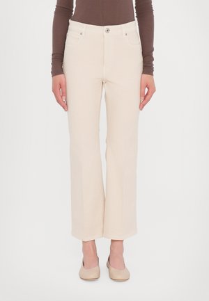 POLONIA - Jeans bootcut - avorio