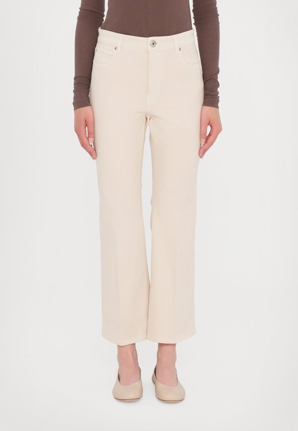 POLONIA - Bootcut jeans - avorio