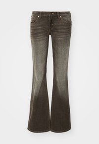 Ugentede jeans lavet af grå denim med en falmet vask-effekt. Har fem lommer, metalbeslag og en knaplukning i taljen.