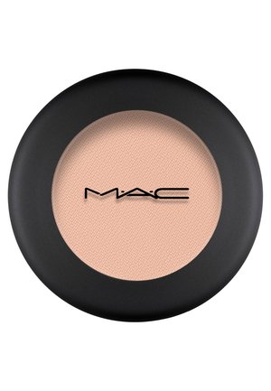 Runder MAC Lidschatten-Pfanne in einem matten, sanften Pfirsichton. Der Behälter verfügt über ein schwarzes Außengehäuse und einen klaren Innendeckel.