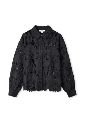 Blusa nera in pizzo con ritagli floreali, colletto, chiusura frontale con bottoni e maniche affusolate. Tessuto texture con un design aperto su tutta la superficie.