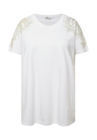 Weißes T-Shirt aus Baumwolle mit kurzen Ärmeln, das auf den Schultern mit aufwendigen beigefarbenen Blumenstickereien verziert ist und einen lockeren Schnitt hat.