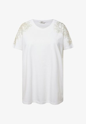 T-shirt bianca in cotone, con maniche corte e raffinati ricami floreali beige sulle spalle, dal taglio morbido.