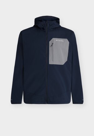 Giacca blu navy con zip e cappuccio, con una grande tasca con zip grigia sul petto sul lato sinistro, logo Columbia sulla tasca.